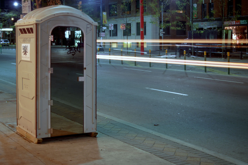 Public Water Closet, modified portable toilet, 2-way mirror glass (Ottawa and Toronto) 1998, photos: Adrian Blackwell
